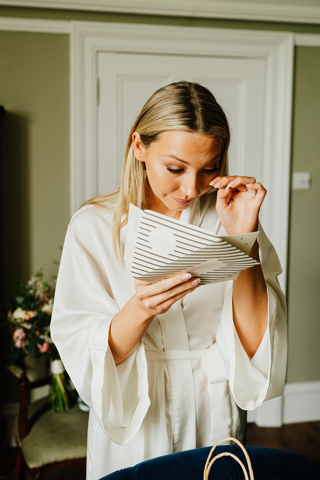bride cries and she reads a card