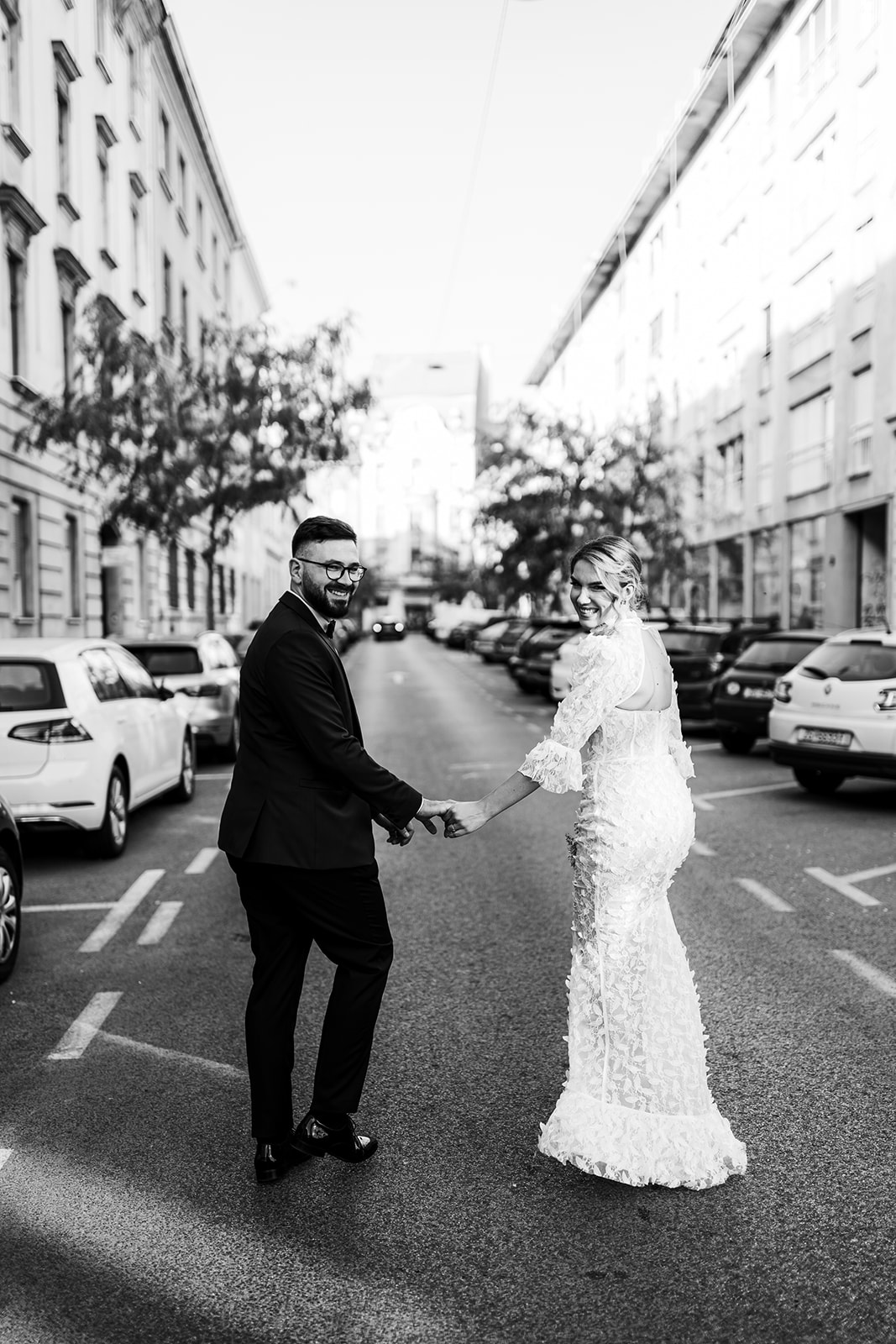 Couple walking trough Zagreb envy room dress