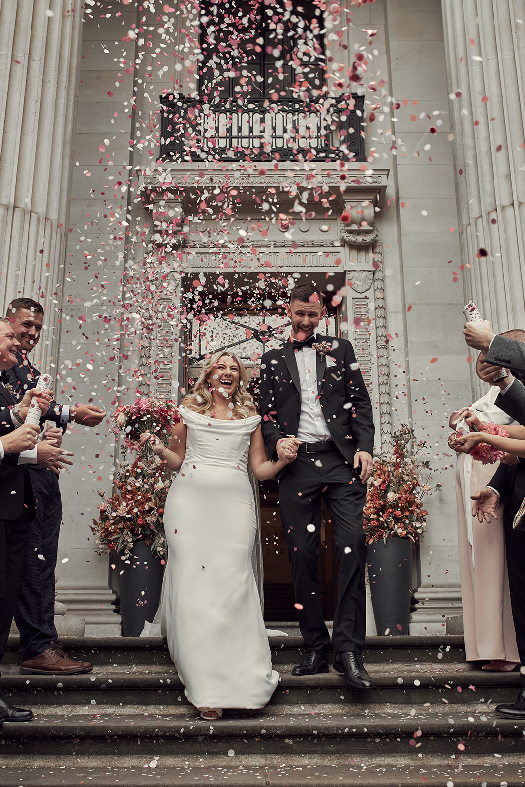 Katy and Max welcomed with confetti toss at  Marylebone Town Hall