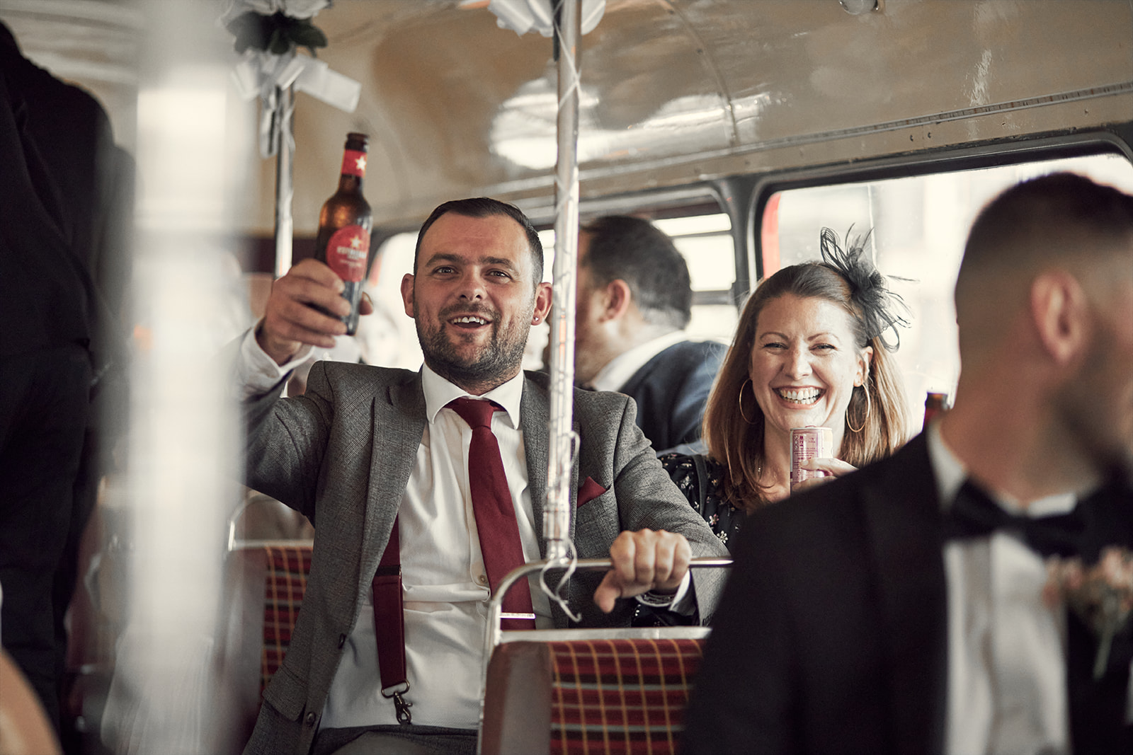 post-wedding celebration in the bus with guests