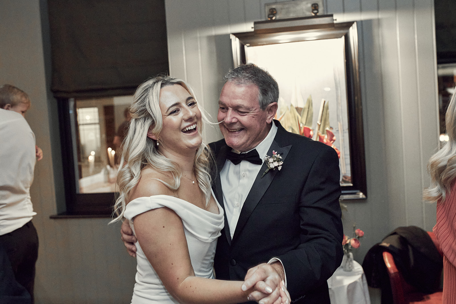 sweet candid portrait of Katy and her father dancing at the wedding reception  at Beaufort House