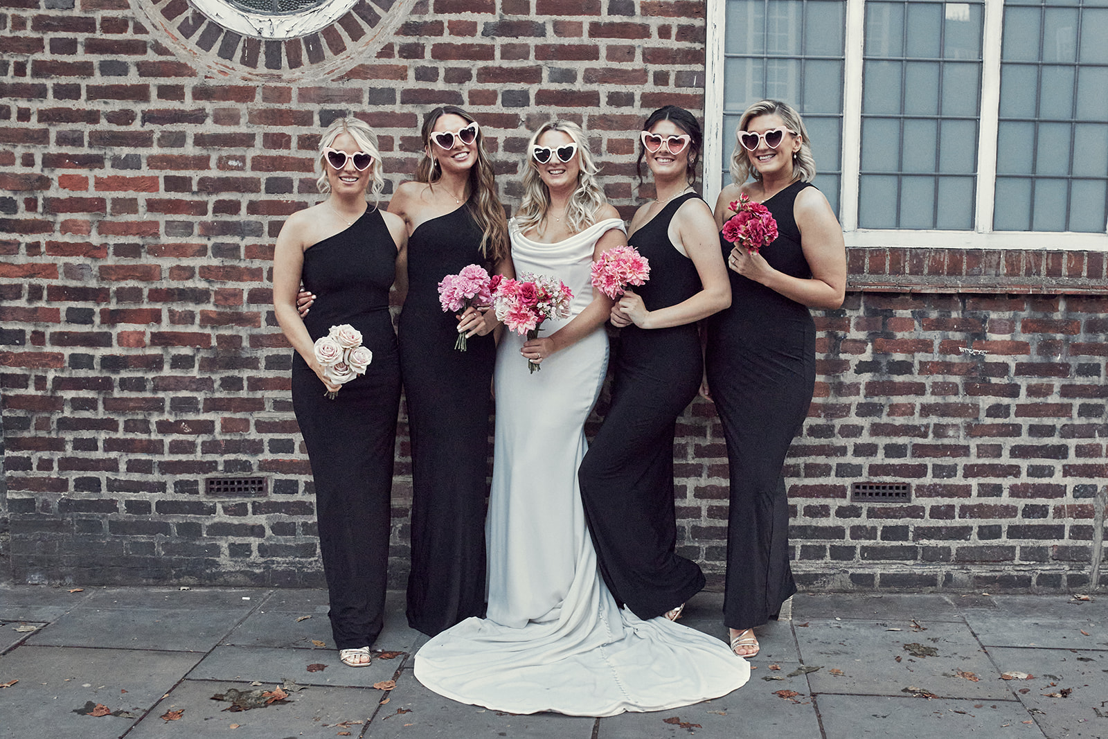 sweet portrait of Katy and bride's maids on the streets of London