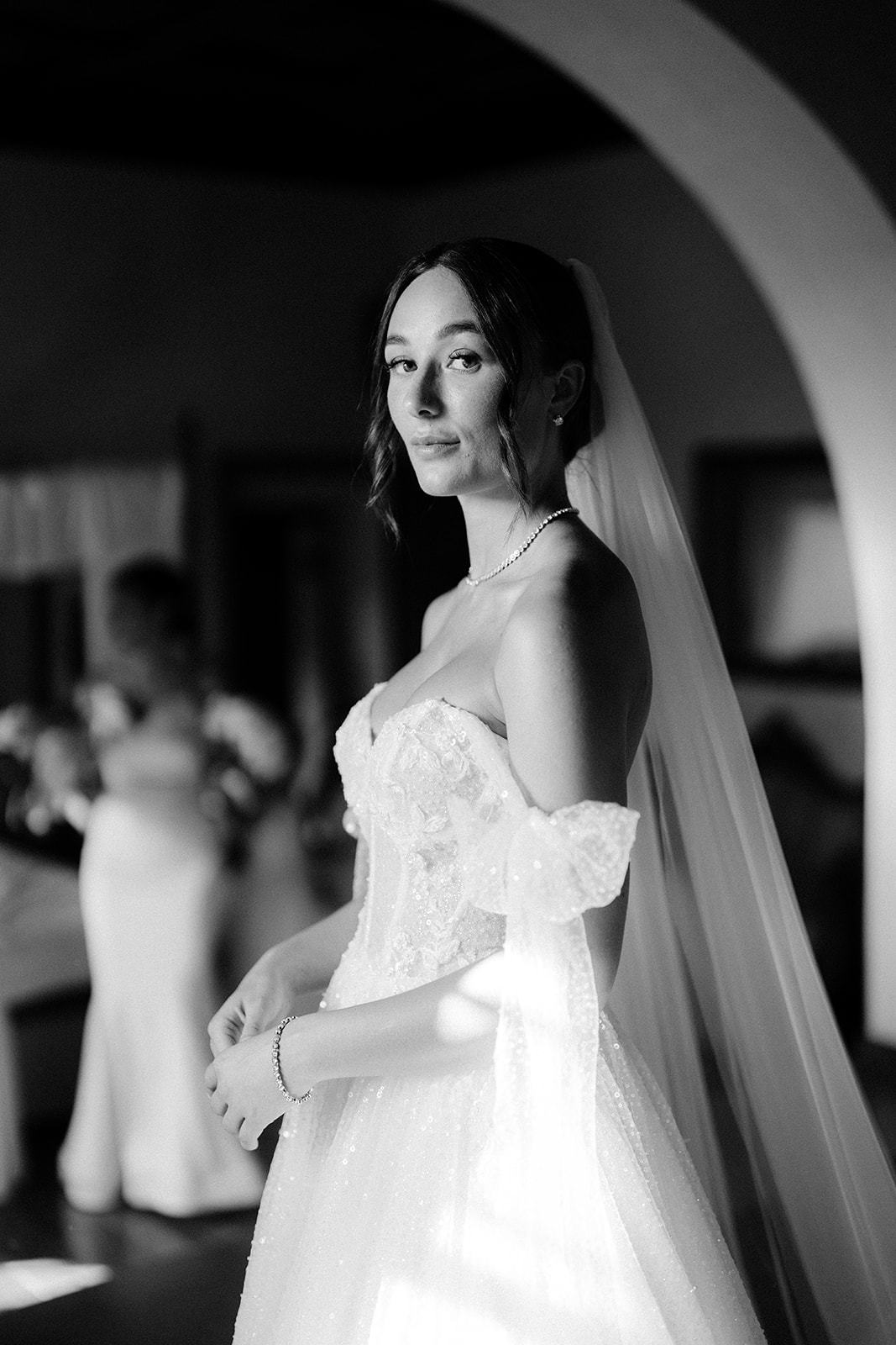 The bride poses in her Maggie Sottero gown