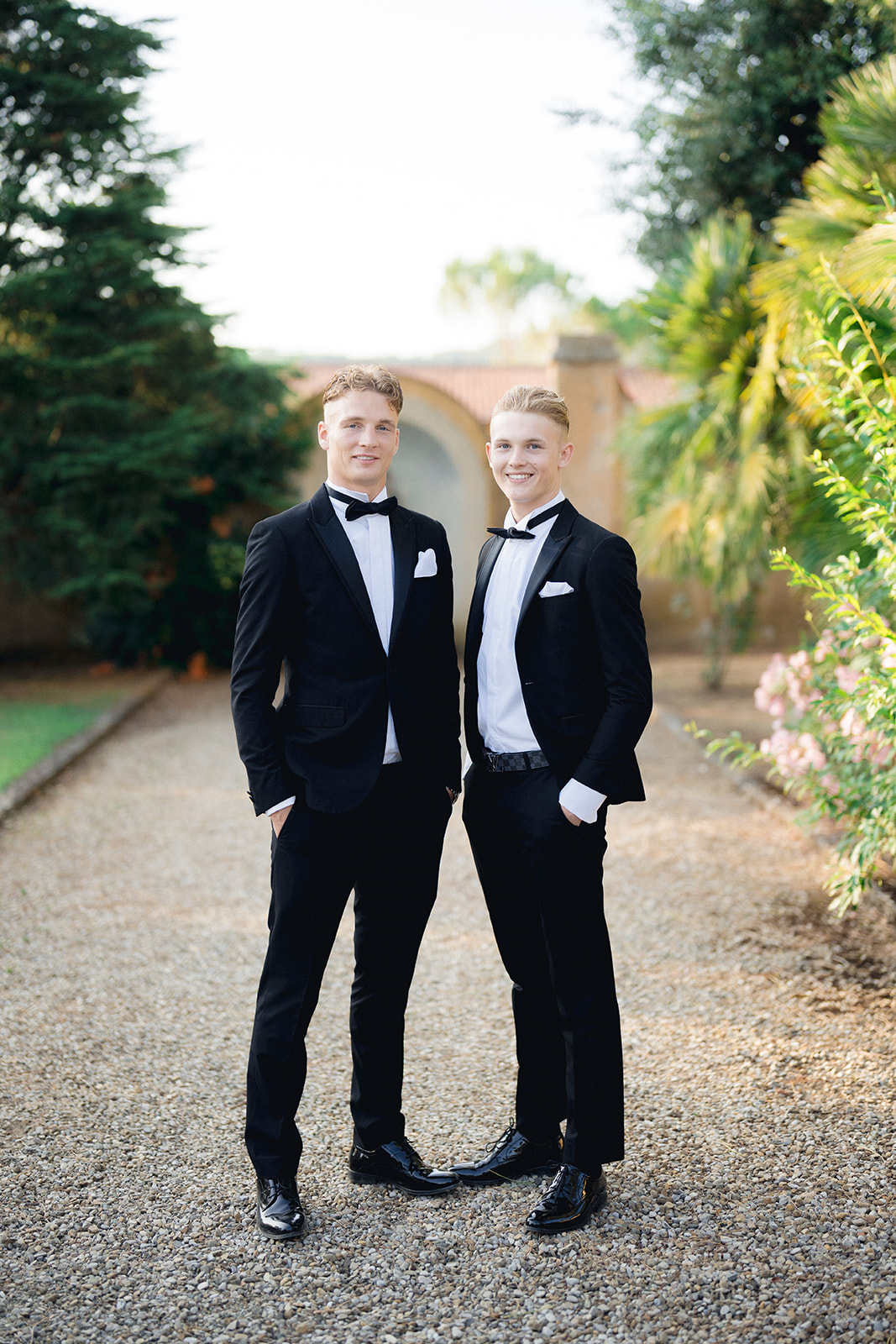 the groom and his brother in black ties