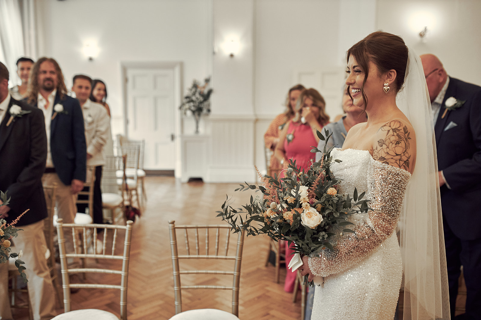 bride smiling while facing her bride