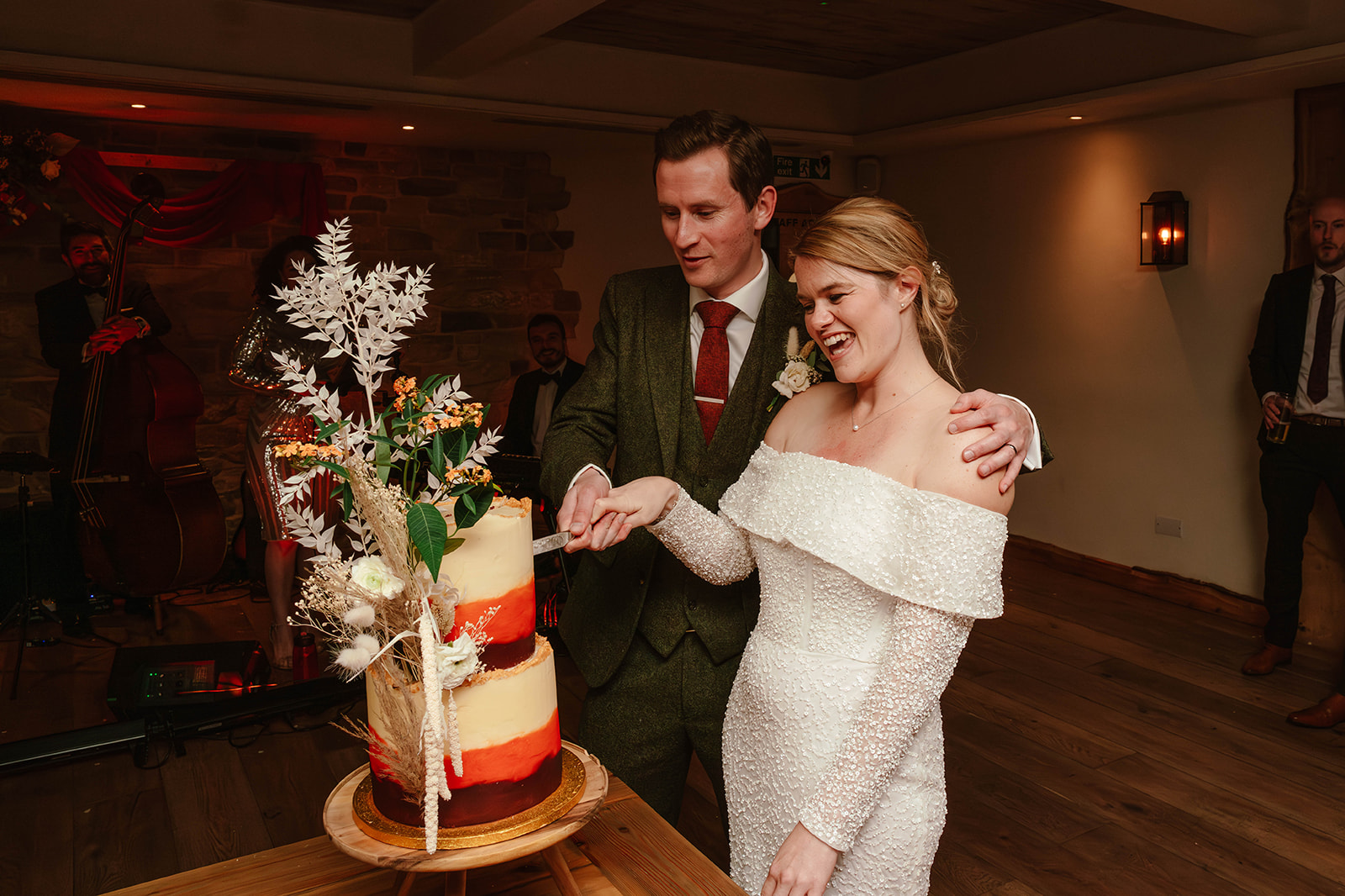 cake cut bride groom Zara Davis Photography Wild Thyme and Honey Cirencester Cotswolds Gloucestershire