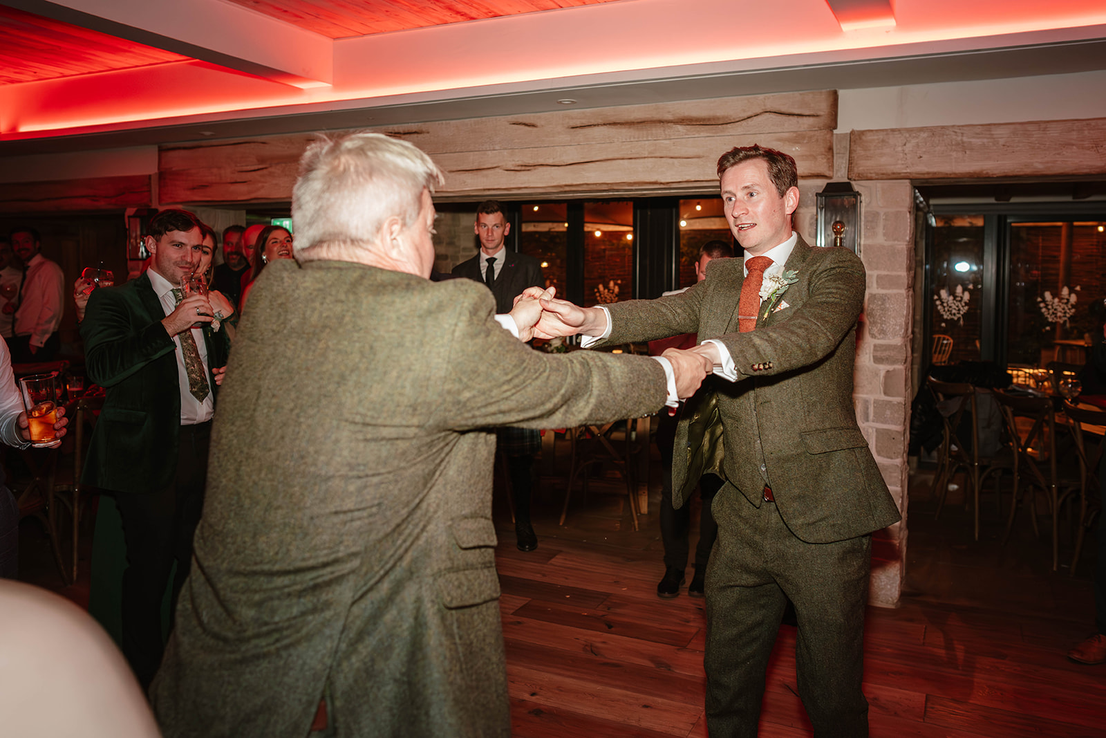 groom and father in law dancing Zara Davis Photography Wild Thyme and Honey Cirencester Cotswolds Gloucestershire
