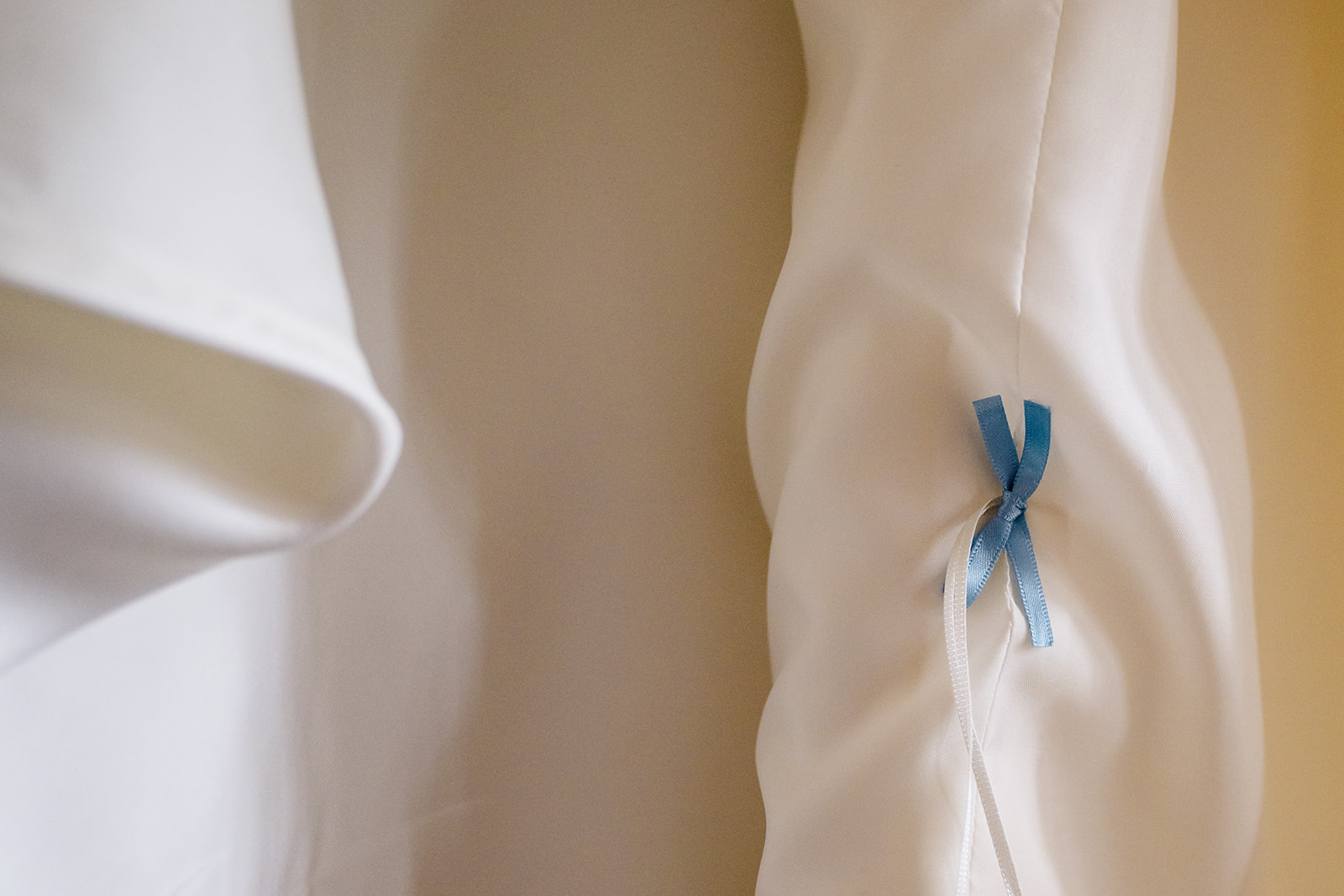 bride has something blue sewn in to her dress