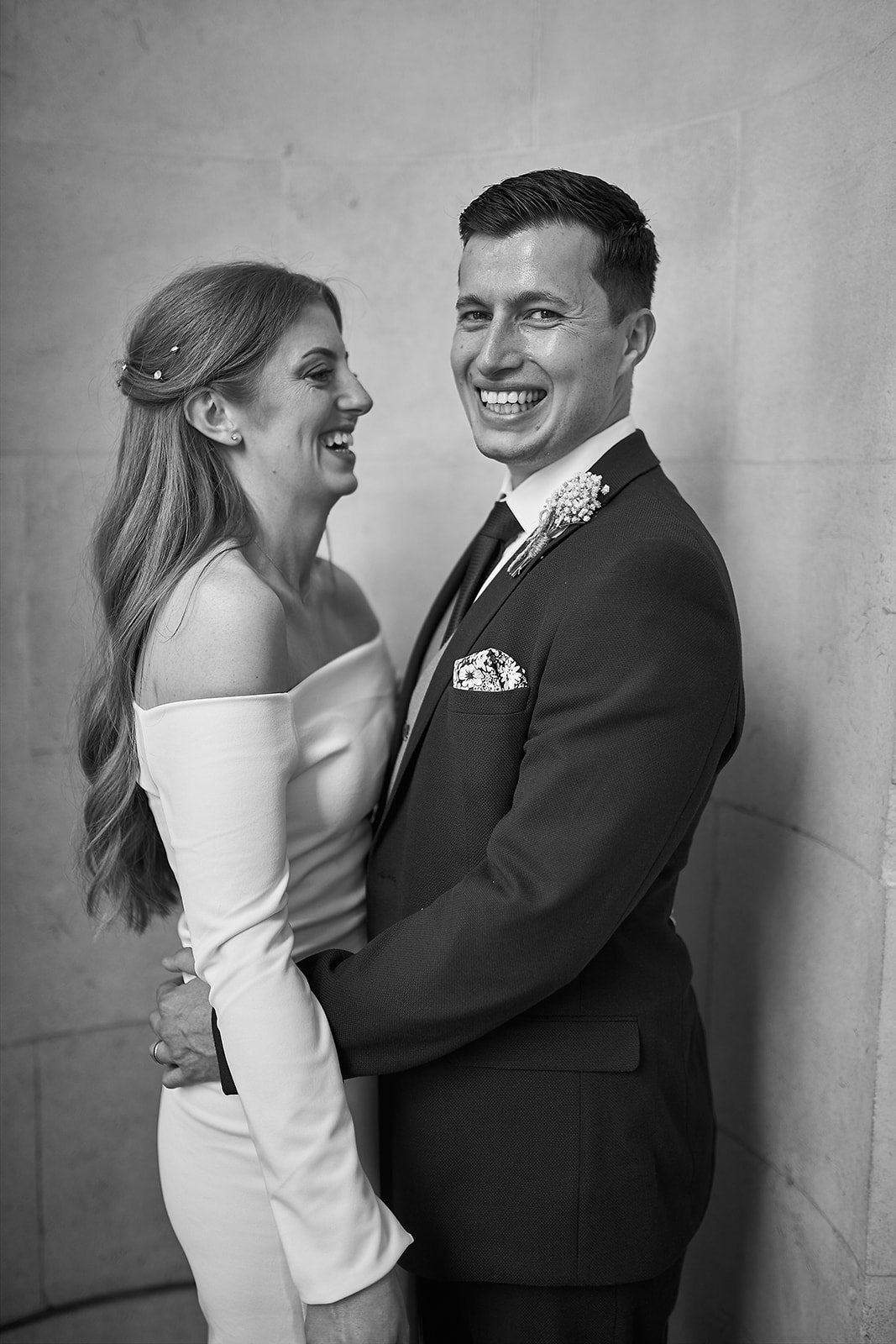 bride and groom side profile portrait in grayscale