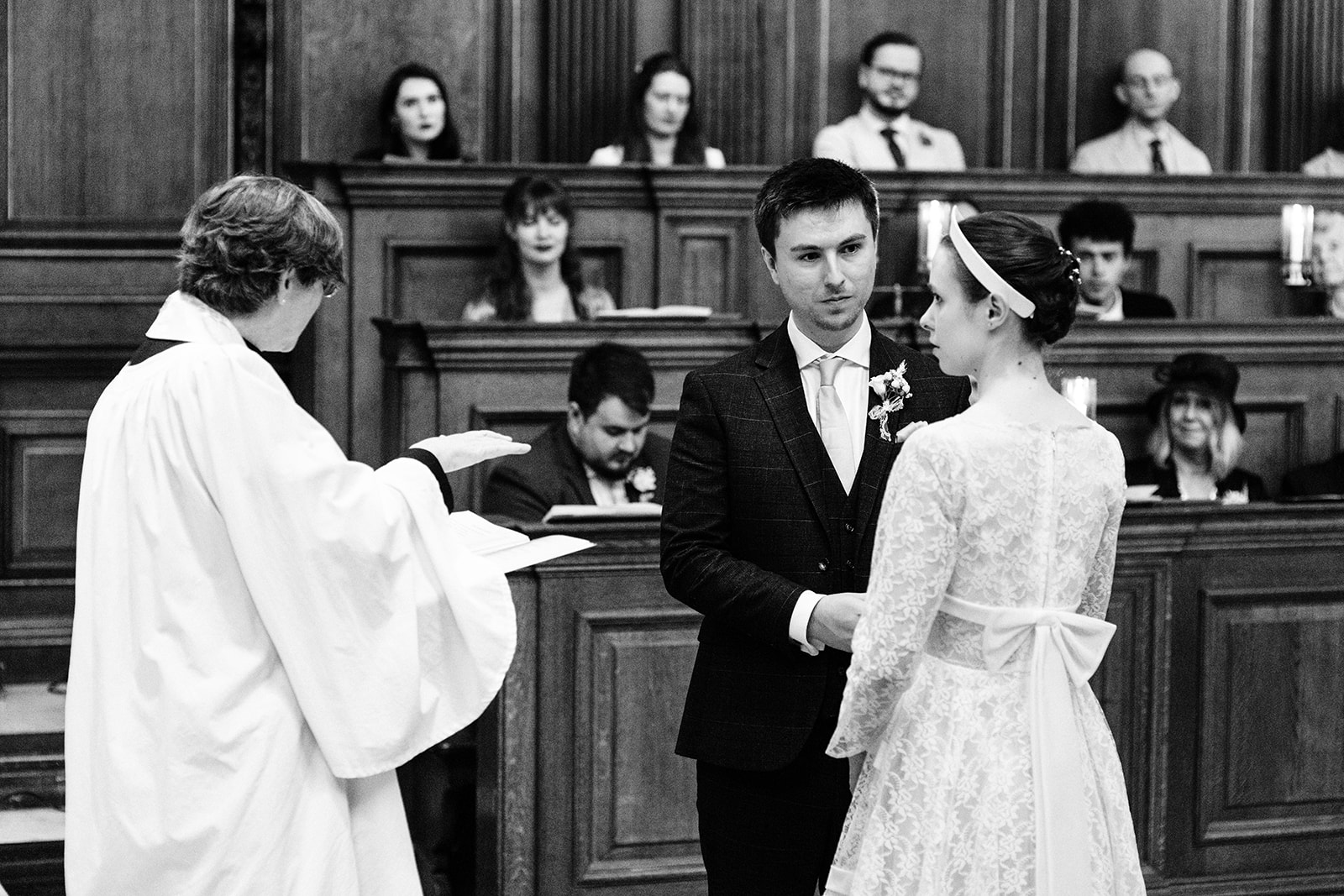 bride and groom vows at Trinity College Chapel