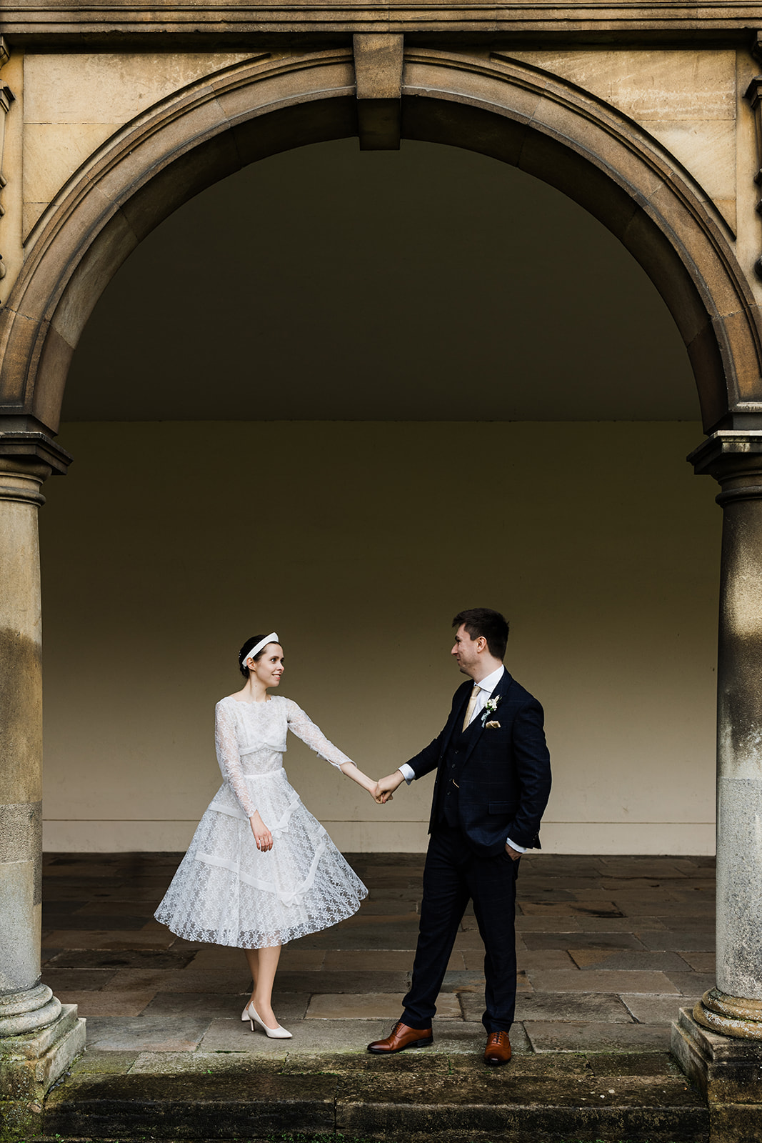 Wedding Couple dance outside Trinity Chapel, Cambridge University