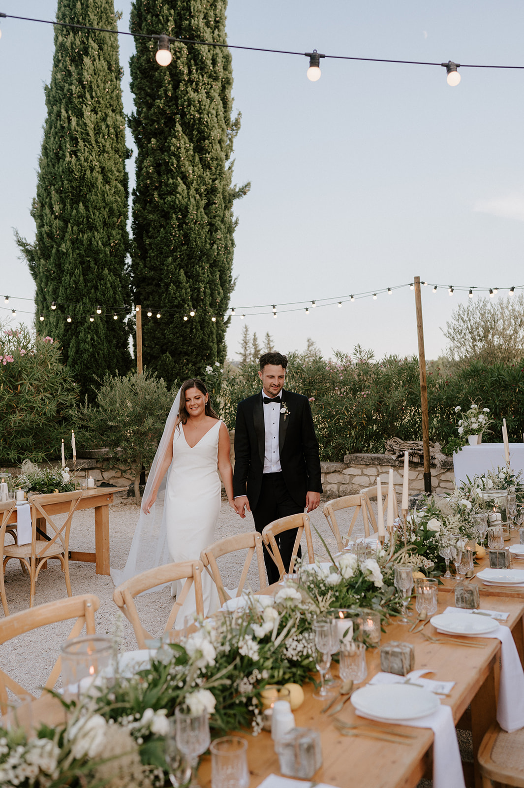 outdoor wedding reception in courtyard provence with bride and groom