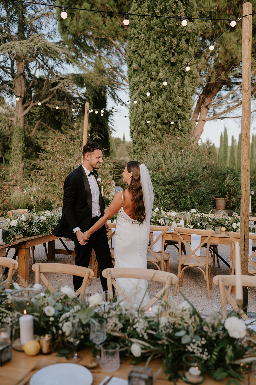 outdoor wedding reception in courtyard provence  with bride and groom