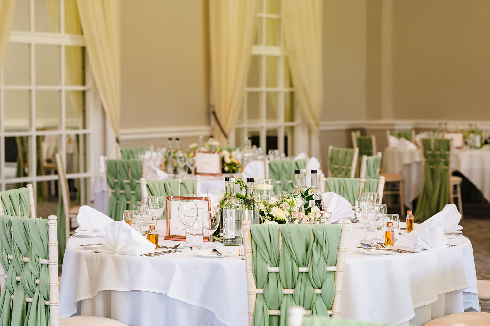 sage green chare sashes tastefully decorate stapleford park hotels ballroom