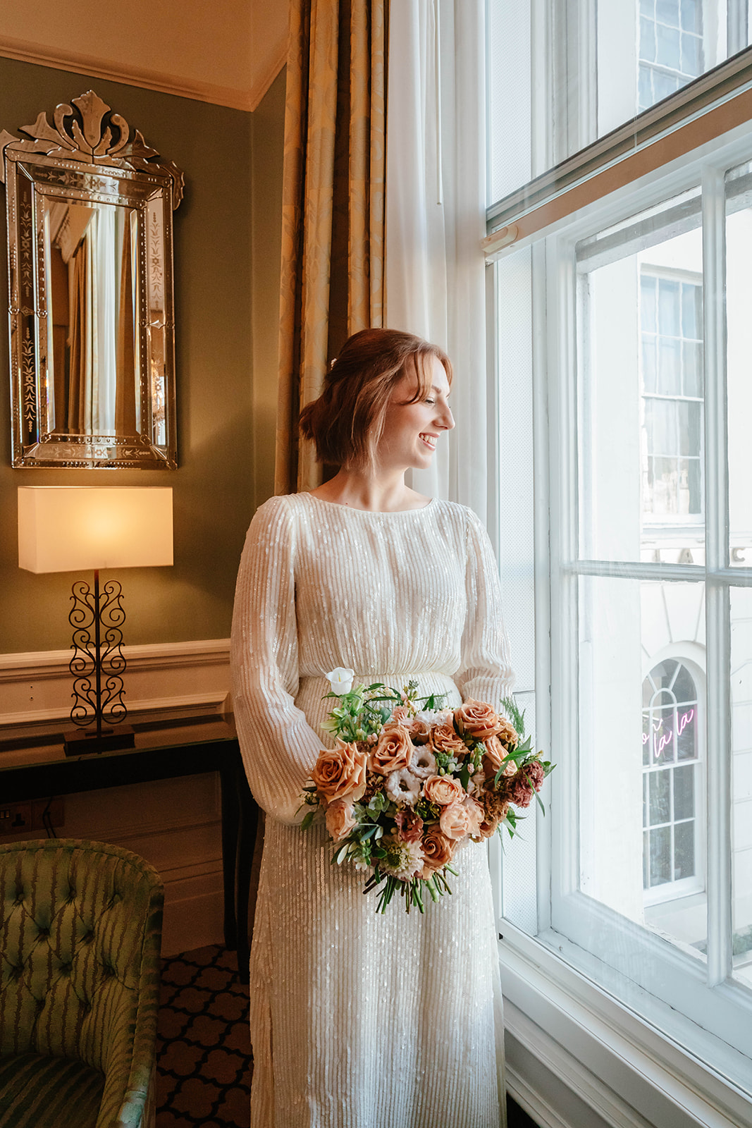Zara Davis Wedding Photography Cotswolds Gloucestershire Cheltenham bridal portrait looking out the window