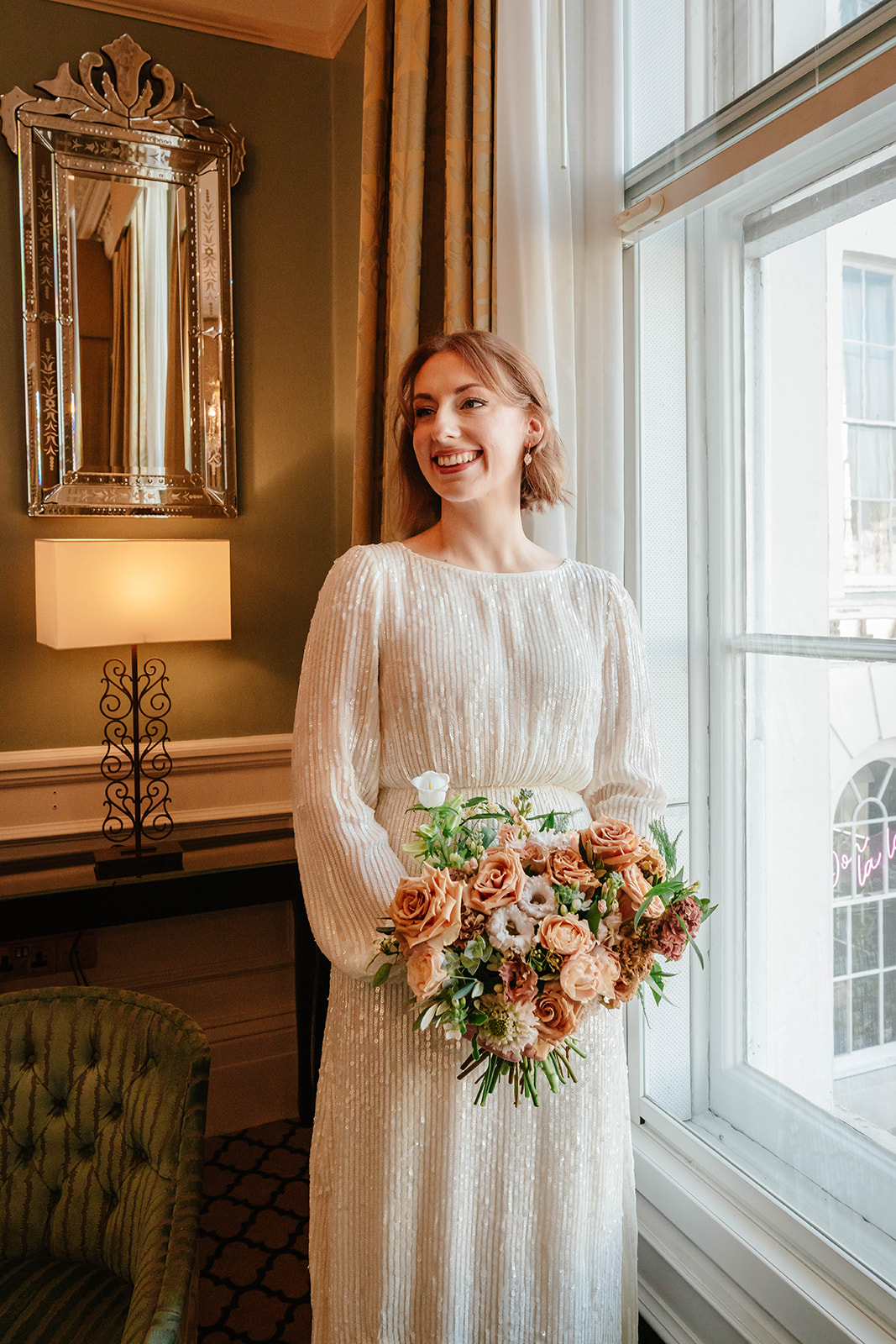 Zara Davis Wedding Photography Cotswolds Gloucestershire Cheltenham bridal portrait looking at others