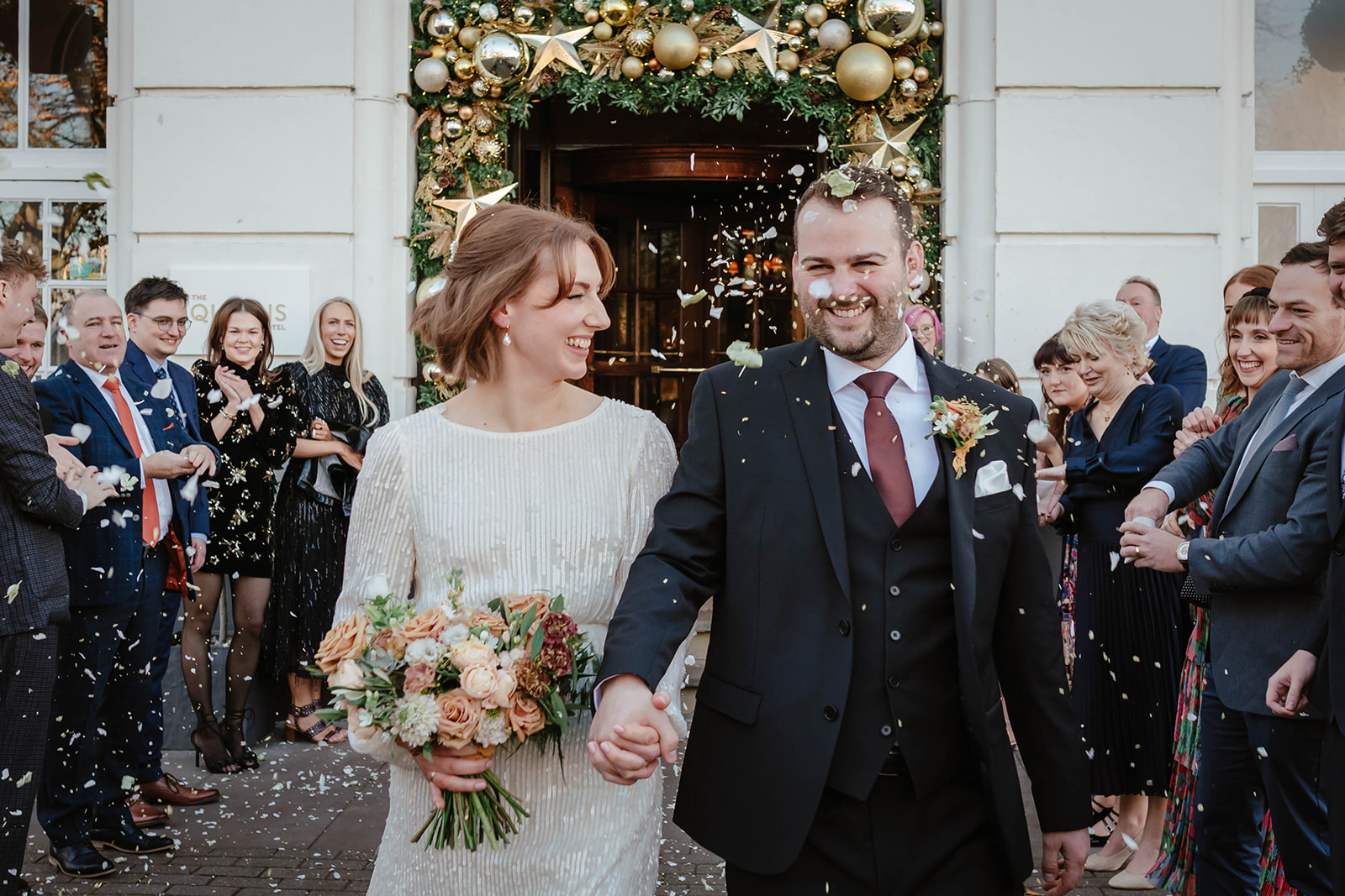 Zara Davis Wedding Photography Cotswolds Gloucestershire Cheltenham close up bride groom confetti