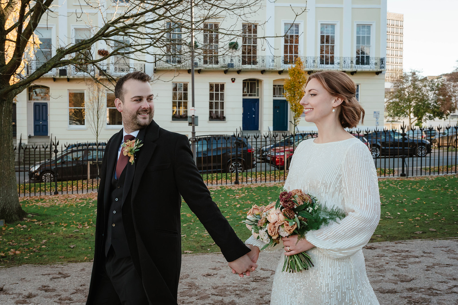 Zara Davis Wedding Photography Cotswolds Gloucestershire Cheltenham Imperial square gardens portrait walking groom look