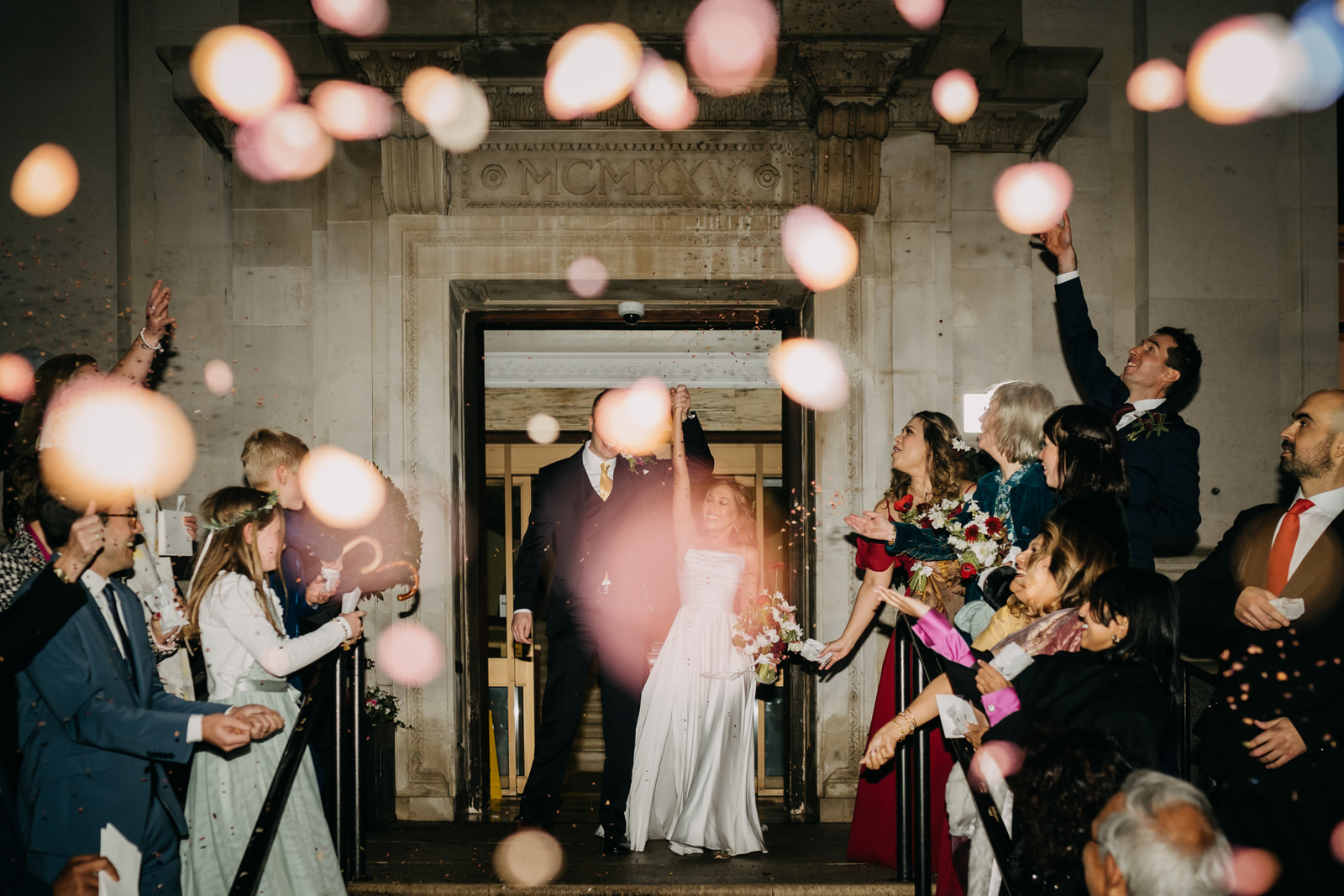 night time confetti with direct flash at islington town hall