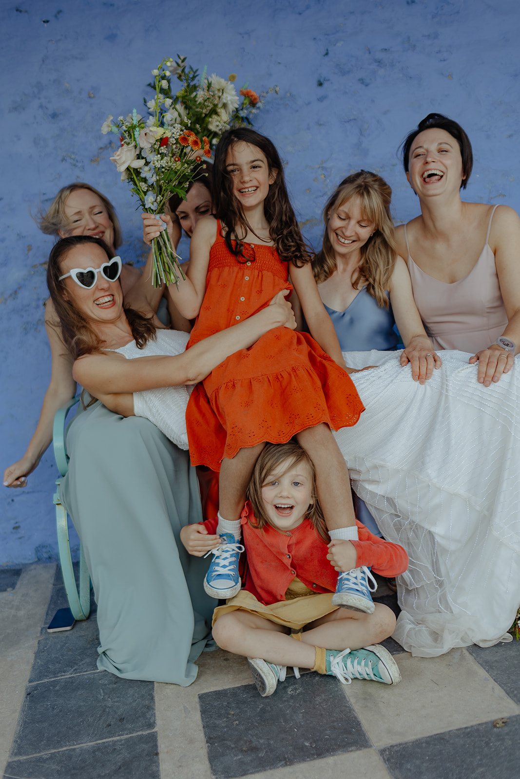 bride with bridesmaids and flower girls at Frances quinn wedding in wales