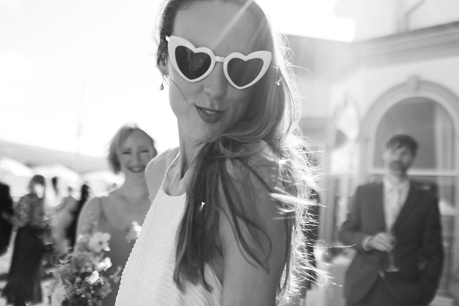 Frances quinn in heart sunglasses at wedding in portmeirion