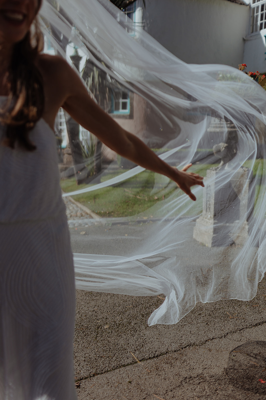 Frances quinn wedding dress veil blowing in the wind