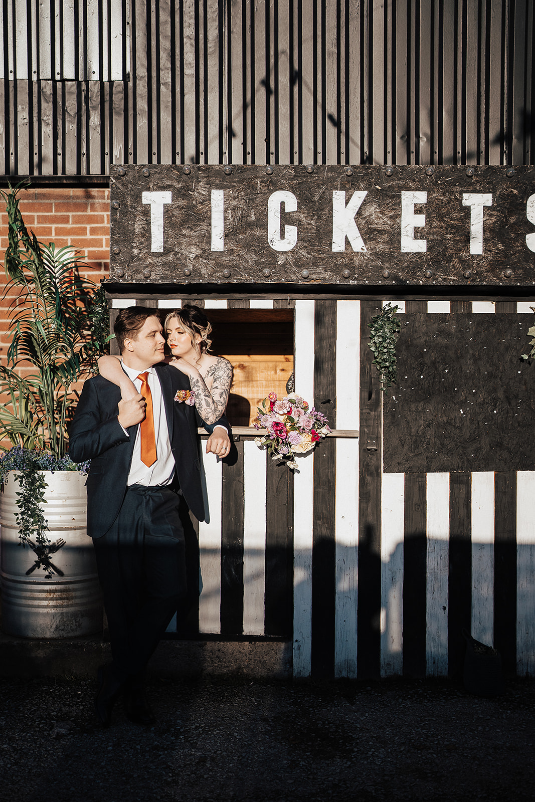couple at the tickets stand | The Chocolate Factory Wedding Derby