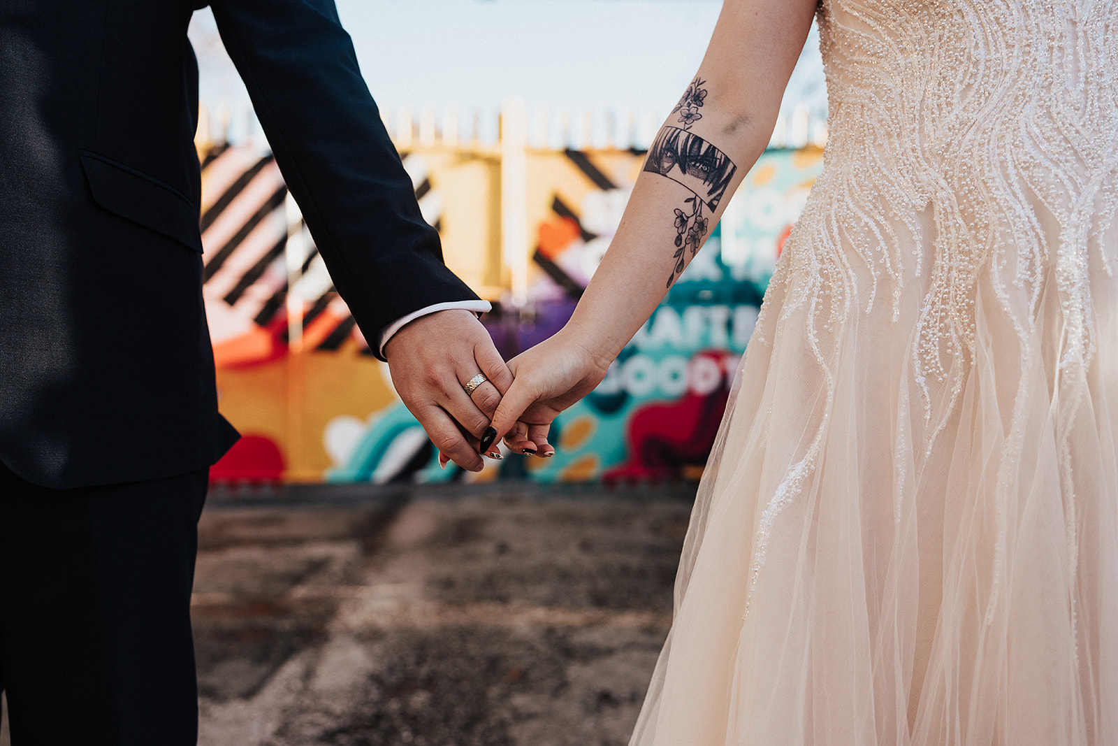 couple hold hands | The Chocolate Factory Wedding Derby