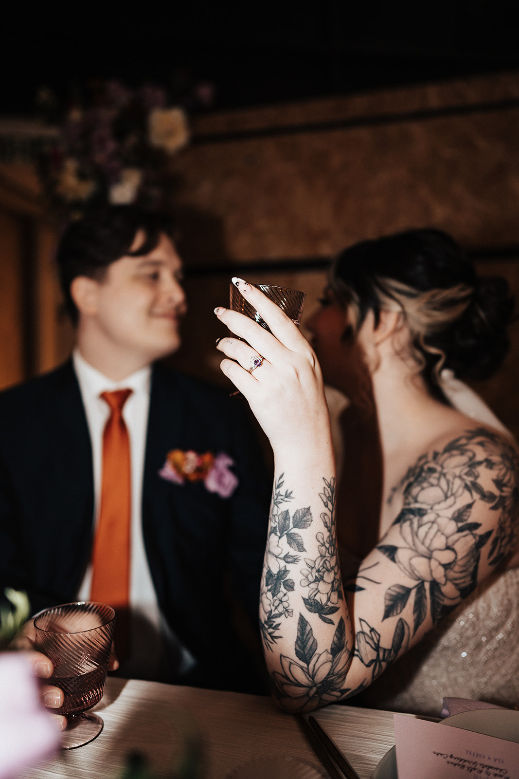 tattooed bride hold drink | Chocolate Factory Wedding Derby