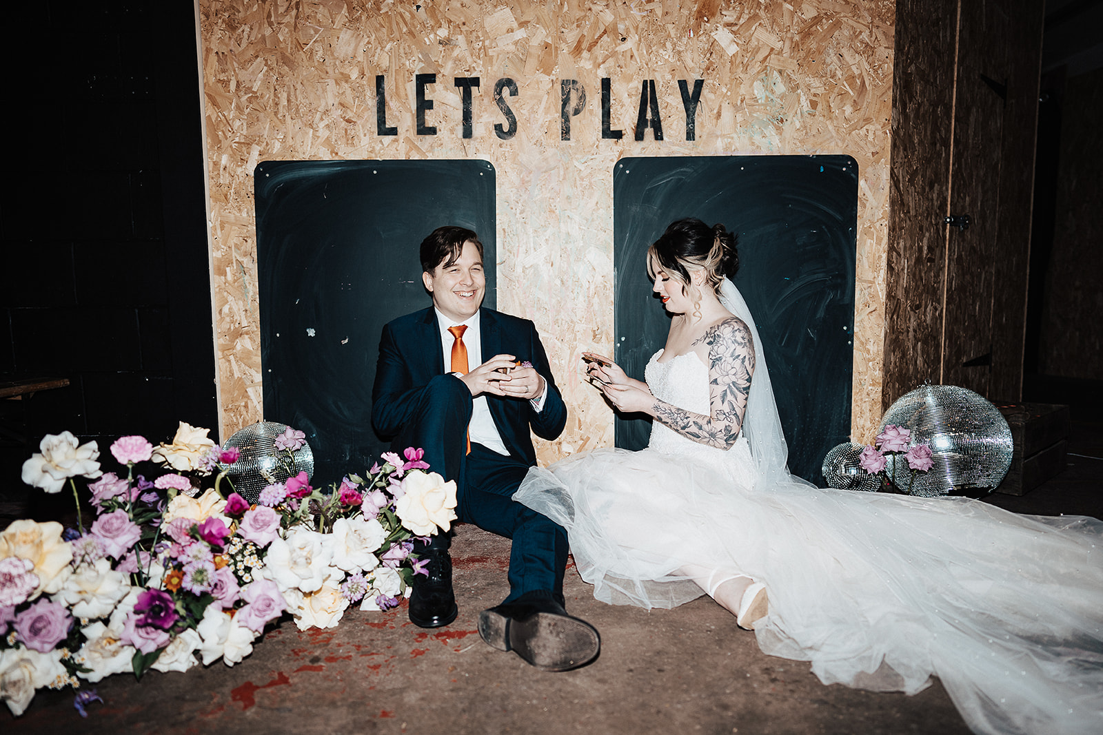 couple play cards  | Chocolate Factory Wedding Derby