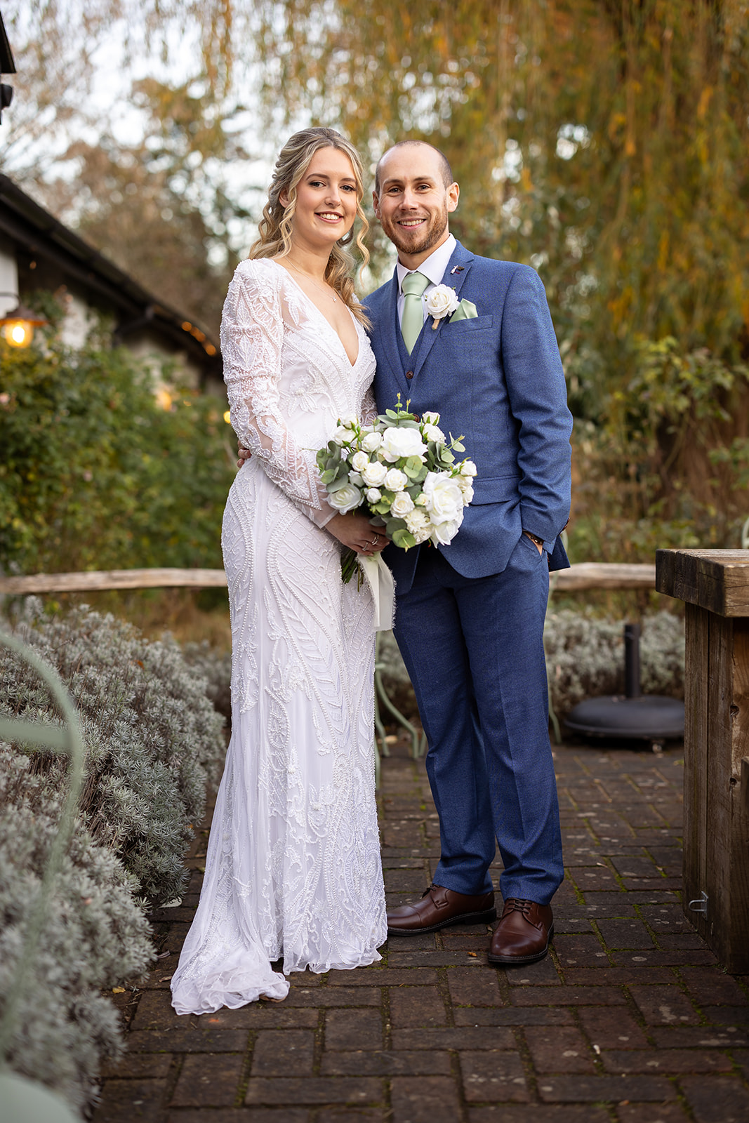 Nestled in the heart of the Test Valley, a couple's love story unfolded at the Kimbridge Barn in Romsey, Hampsh