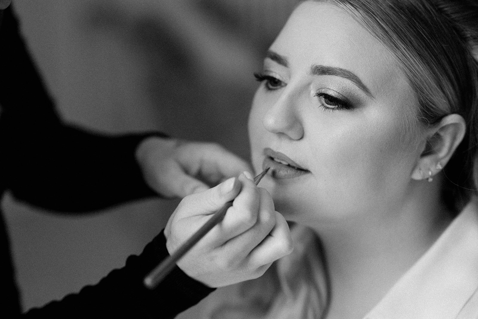 bride having lipstick touch ups at butley priory