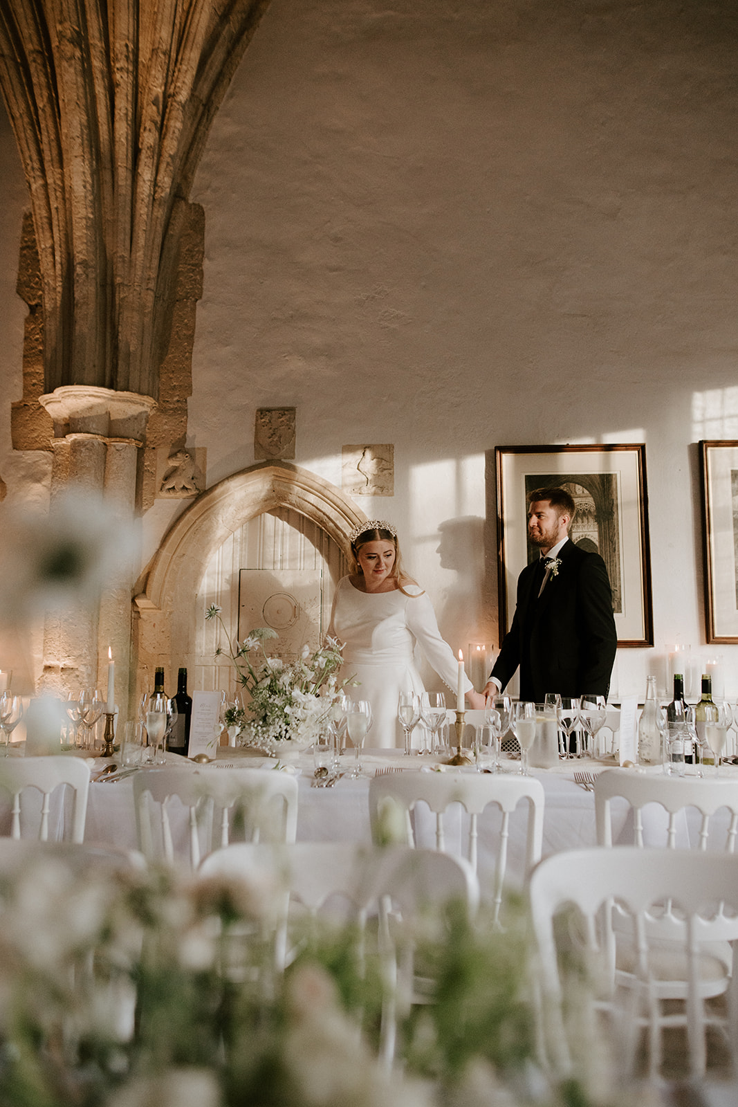 wedding reception in great hall at butley priory with neutral colour scheme