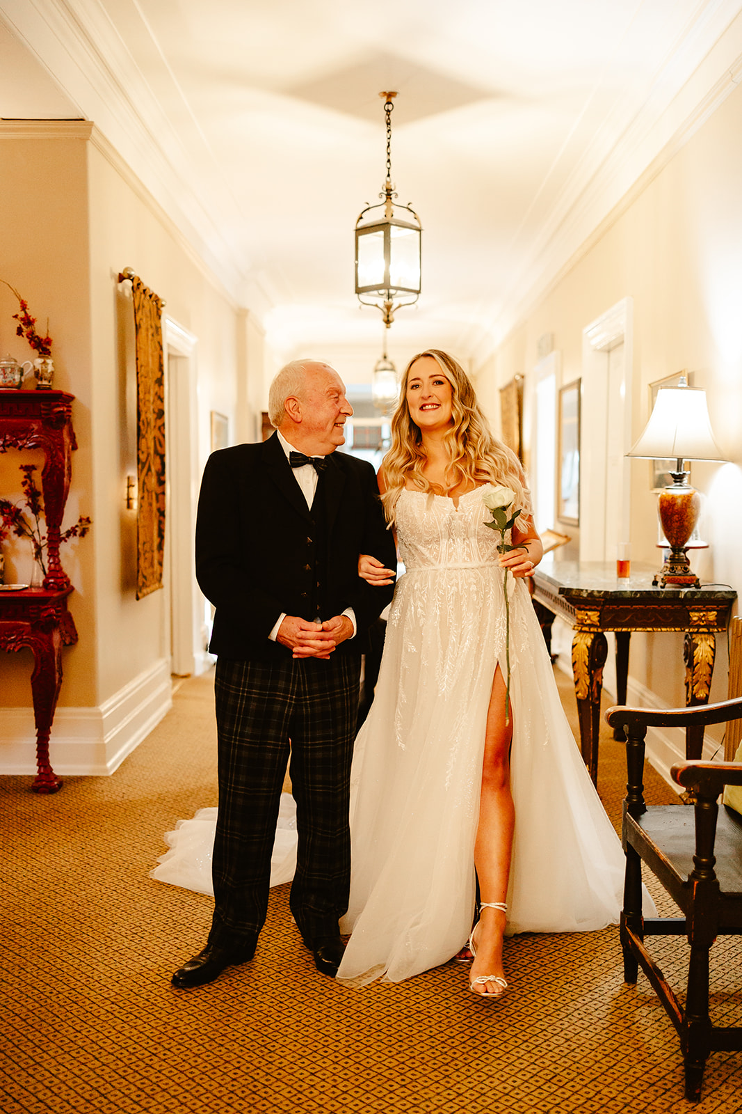 bride and father at raemoir house before walking down the aisle
