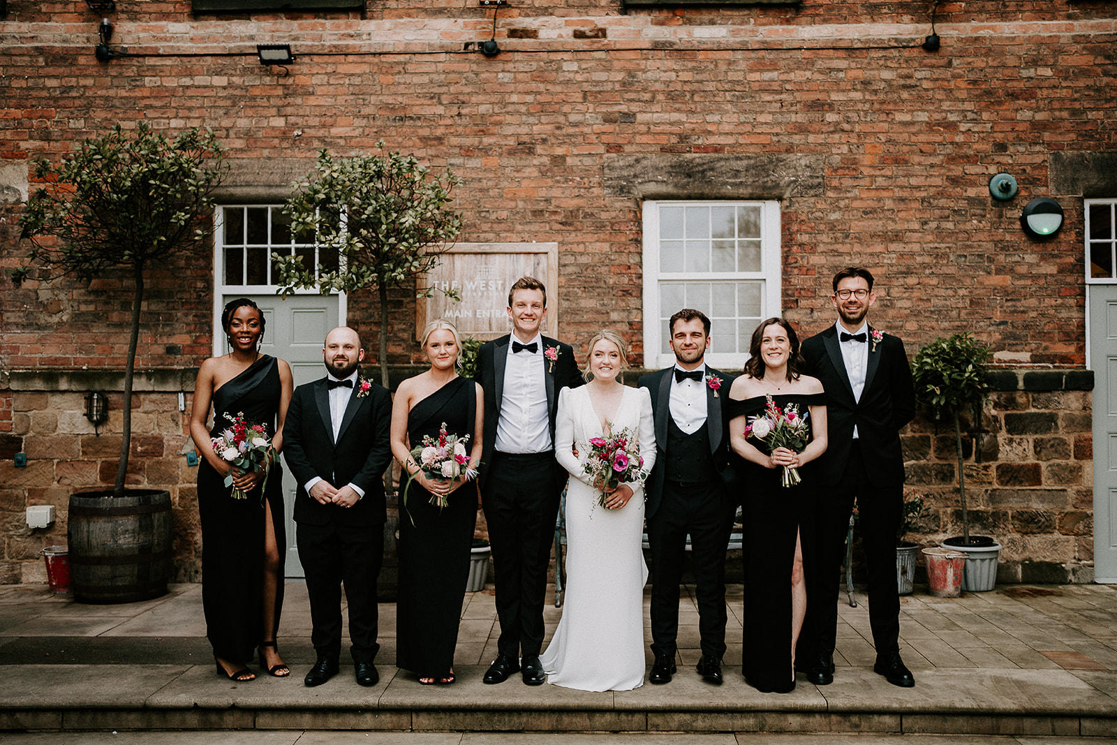 A Black Tie Wedding with Pops of Pink for Jamie & Seb at The West Mill, Derby