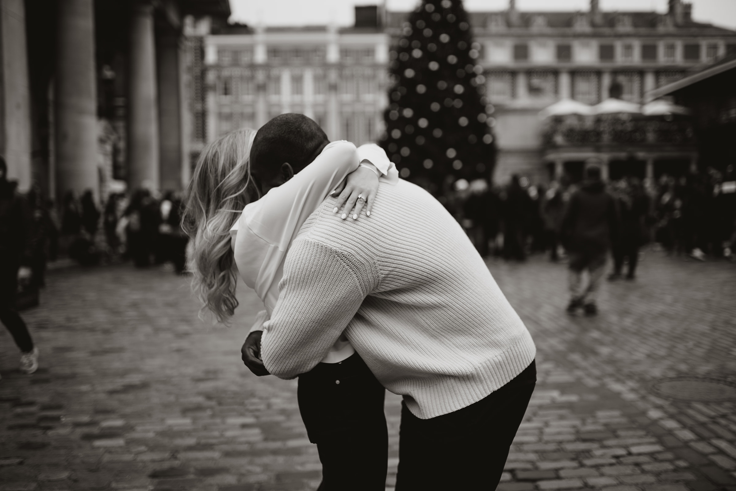 Couple hugging in Covent Garden