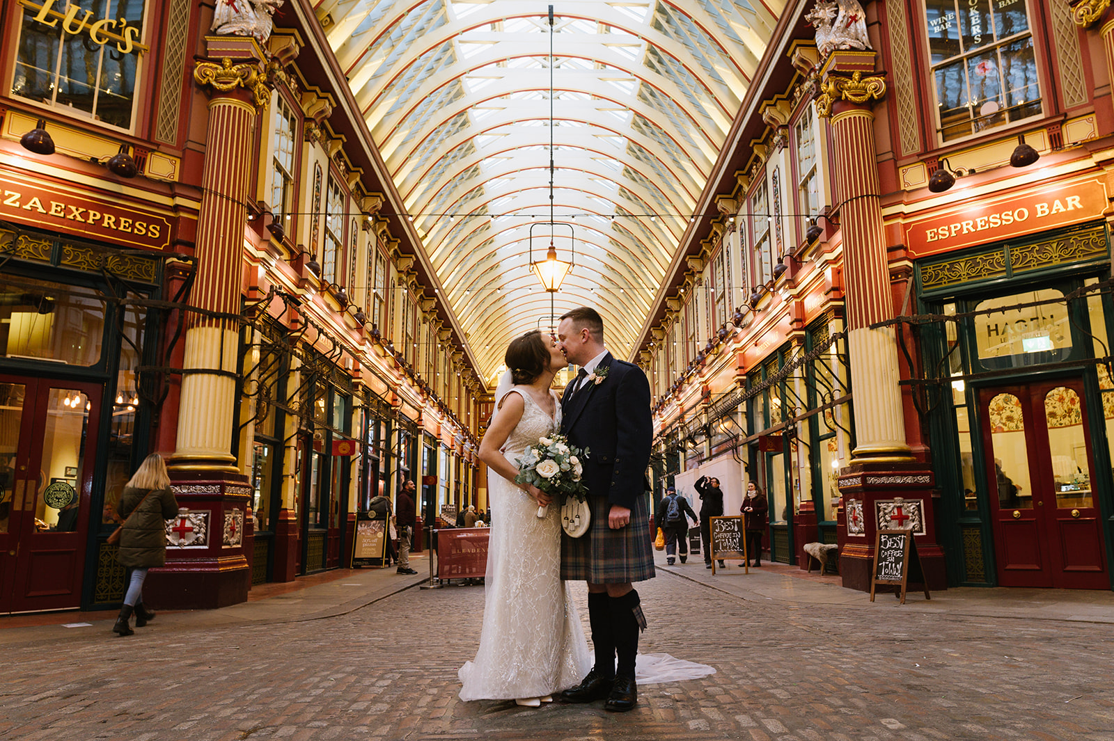 Bride and groom at Leadenhall market in London