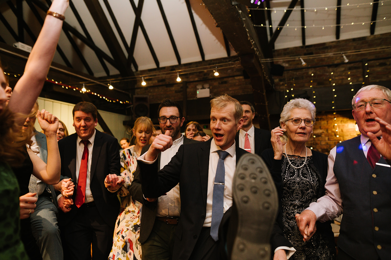 Guests dancing at the Dickens Inn Central London Wedding