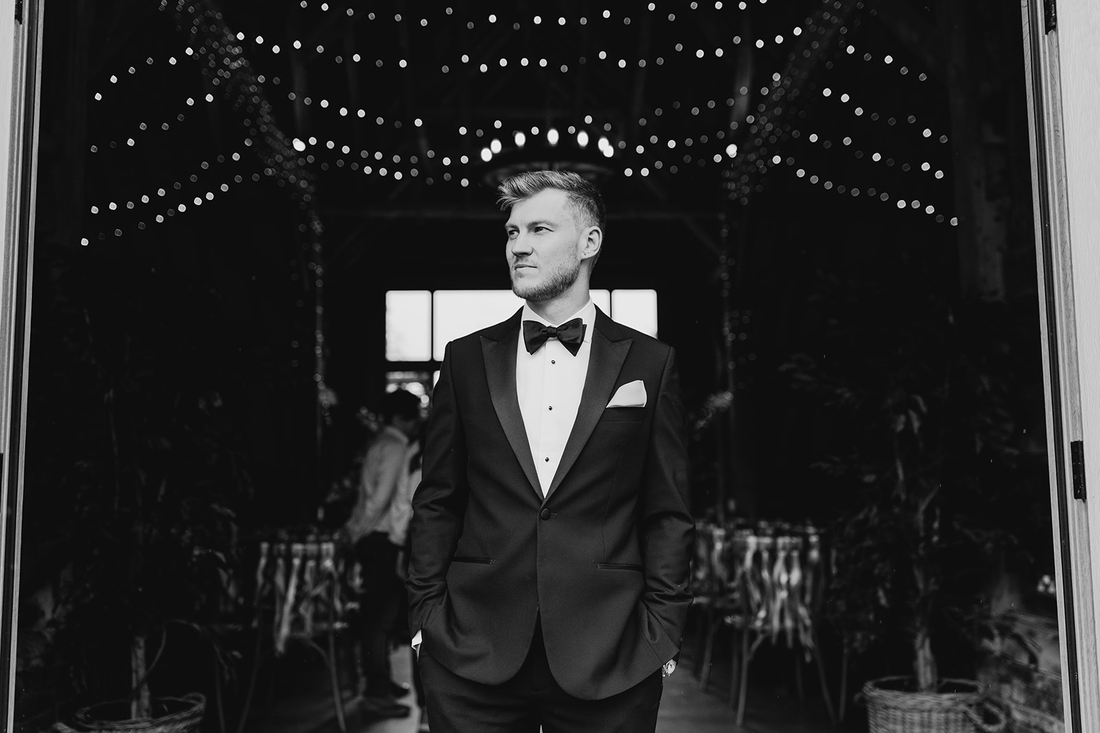 Chris looking dashing in a sleek black tie at his Silchester Farm wedding.