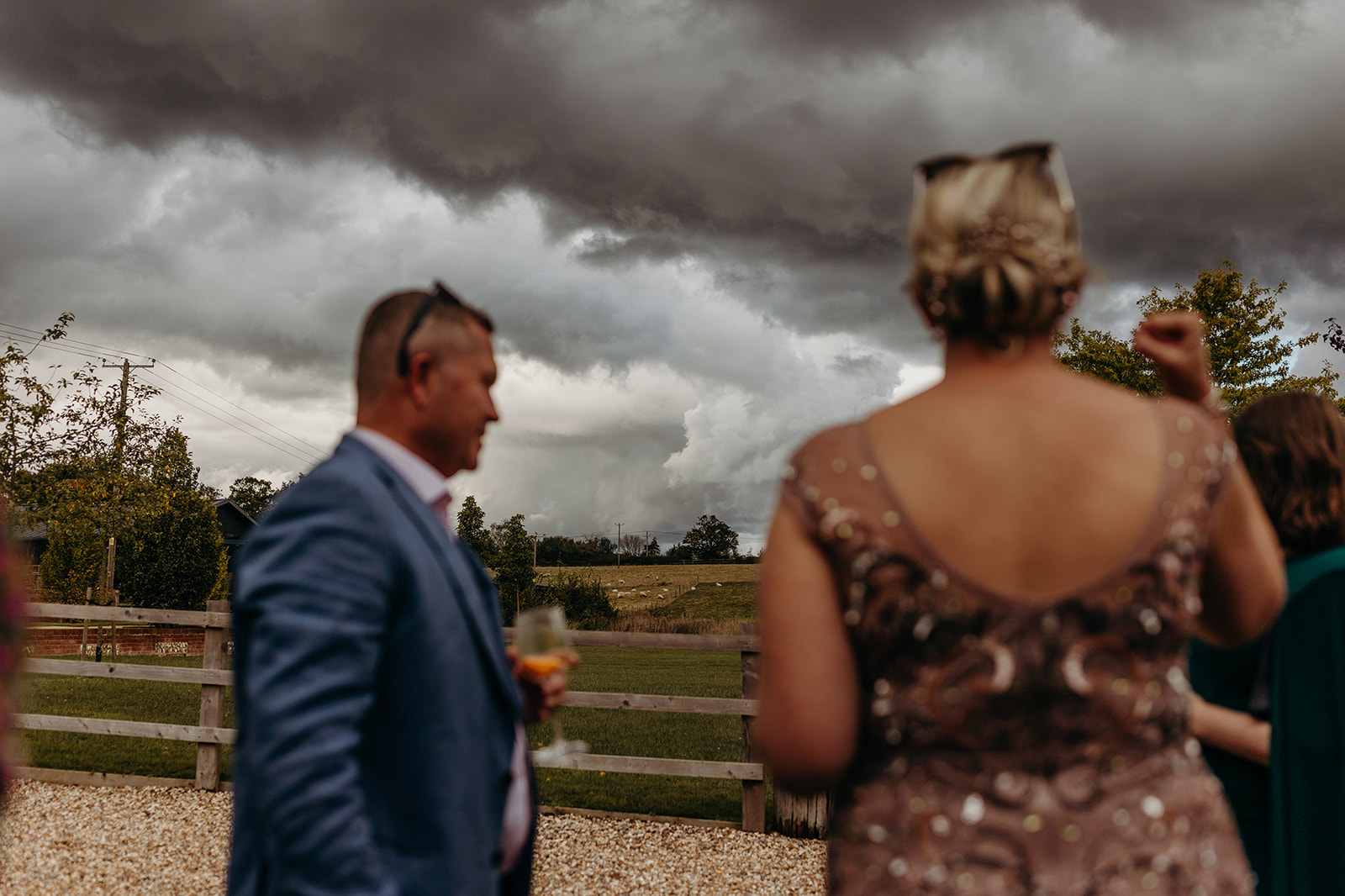 Dramatic skies with guests looking at them