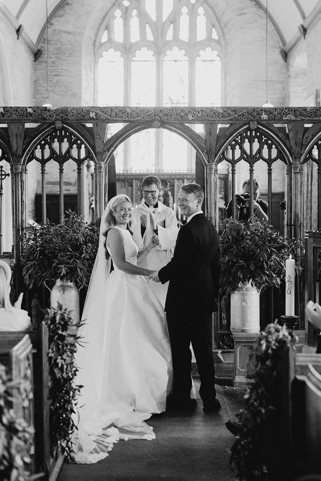 bride and groom at church wedding in Devon