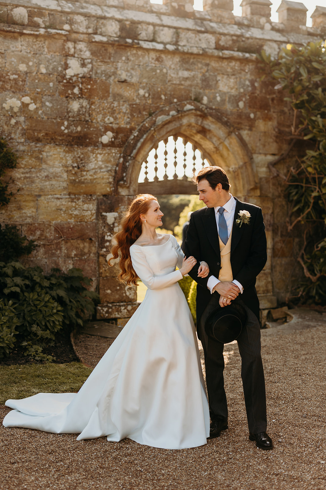 bride and groom get close at Buckhurst Park wedding 