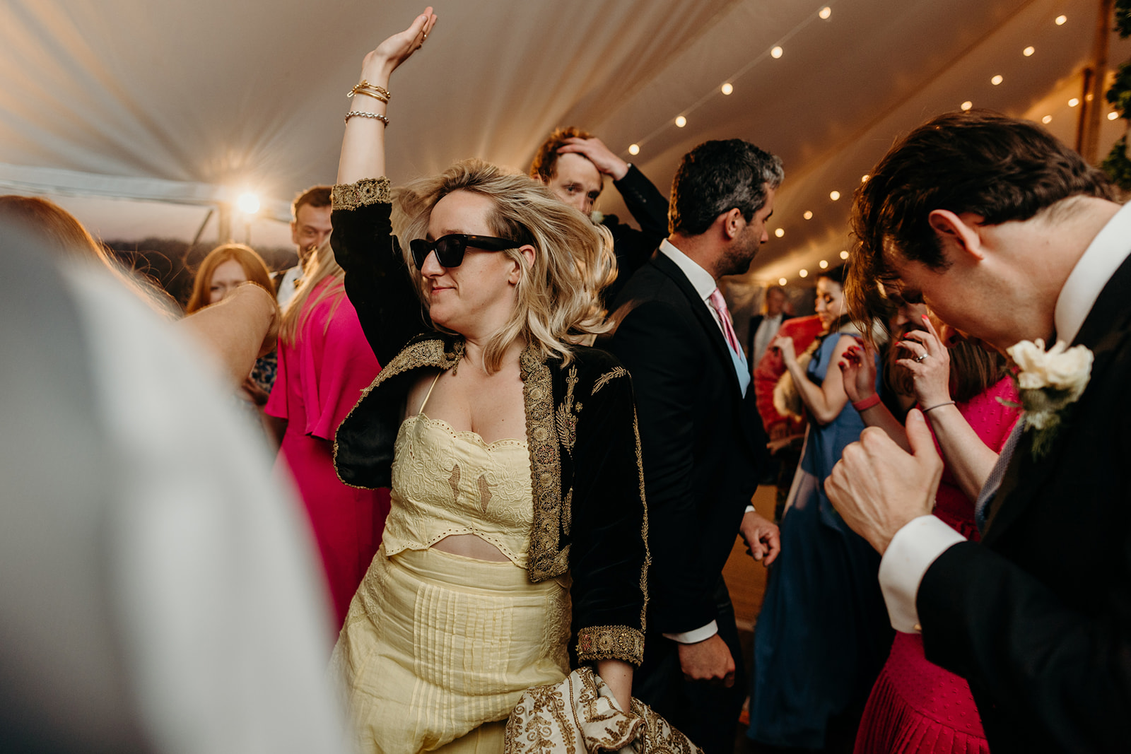 The marquee pulsing with energy as the band performs at the East Sussex wedding.