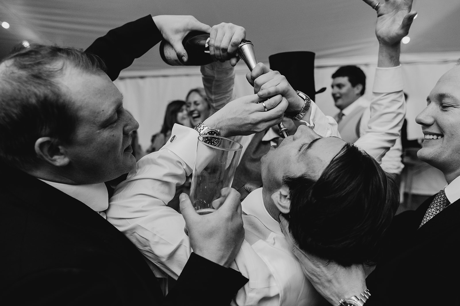 The energy of the marquee celebrations taking on a life of its own at the country house wedding.