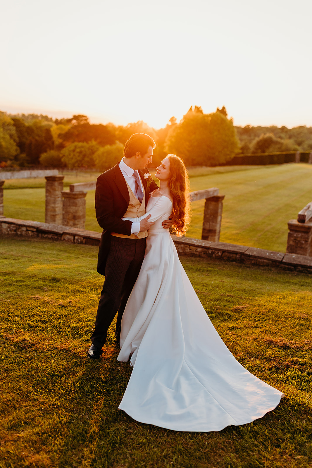 sunset photograph of bride and groom