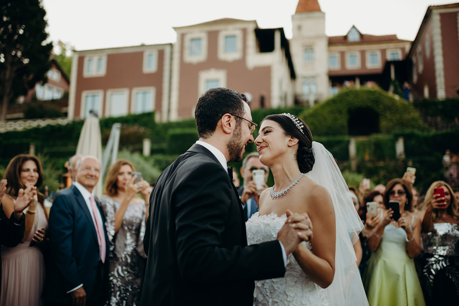First dance between bride and groom at Arab destination wedding in Portugal