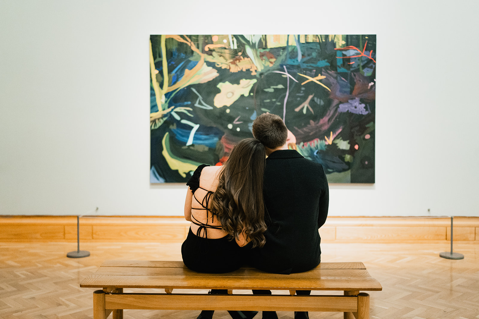 couple admiring art work in an art gallery cardiff