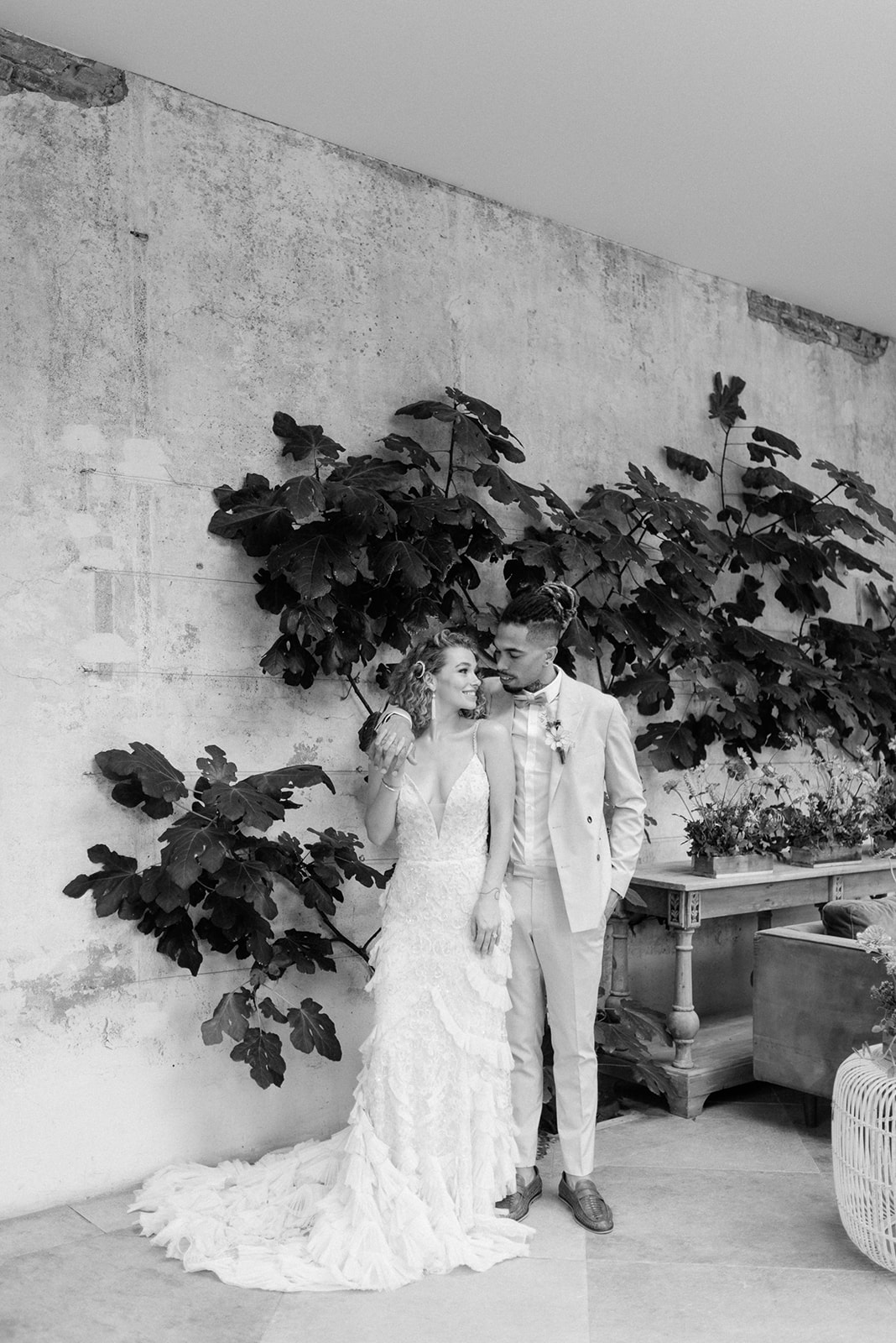 bride and groom standing in fig house at Middleton lodge