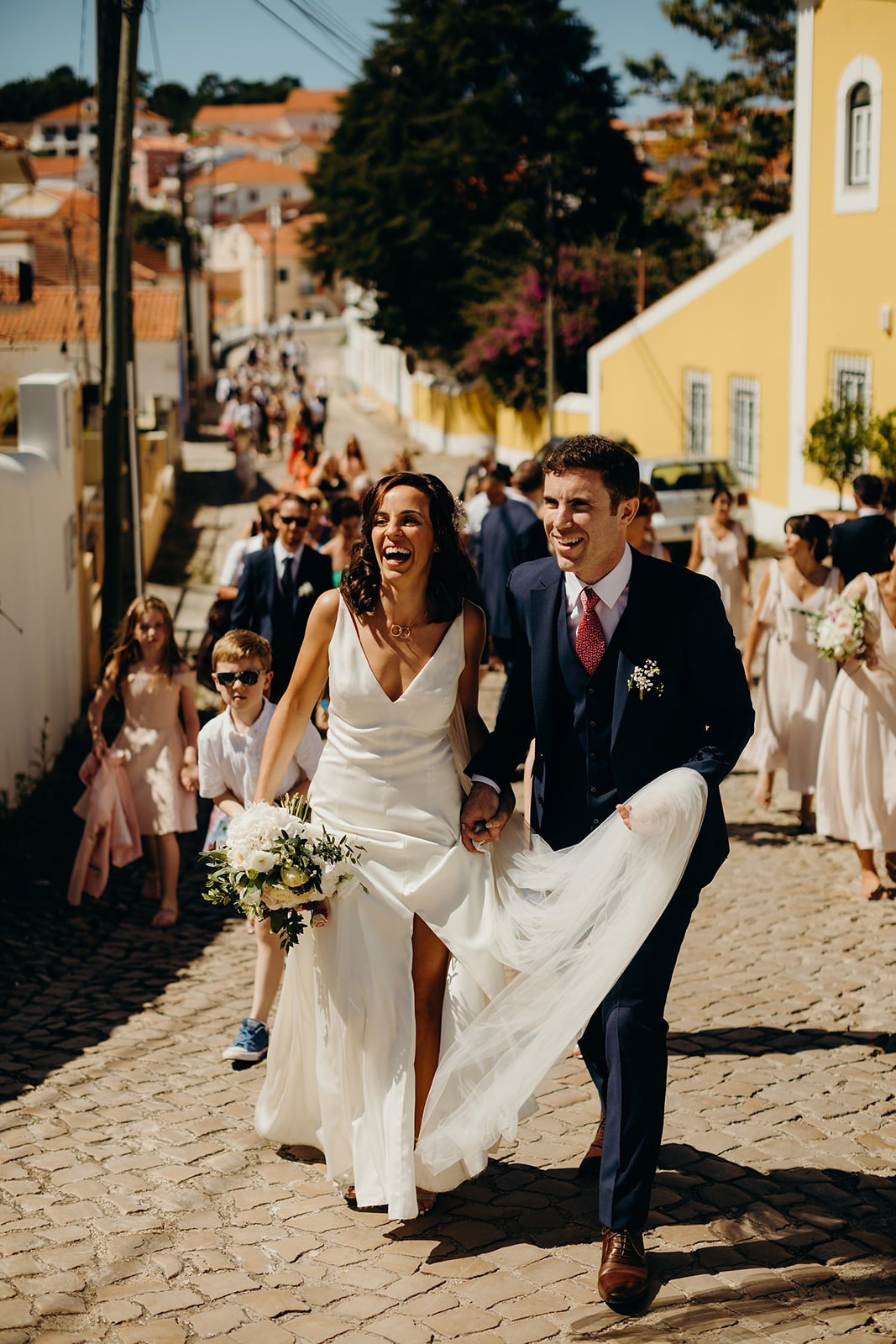 bride and groom walking to Quinta de Sant'ana for drinks reception