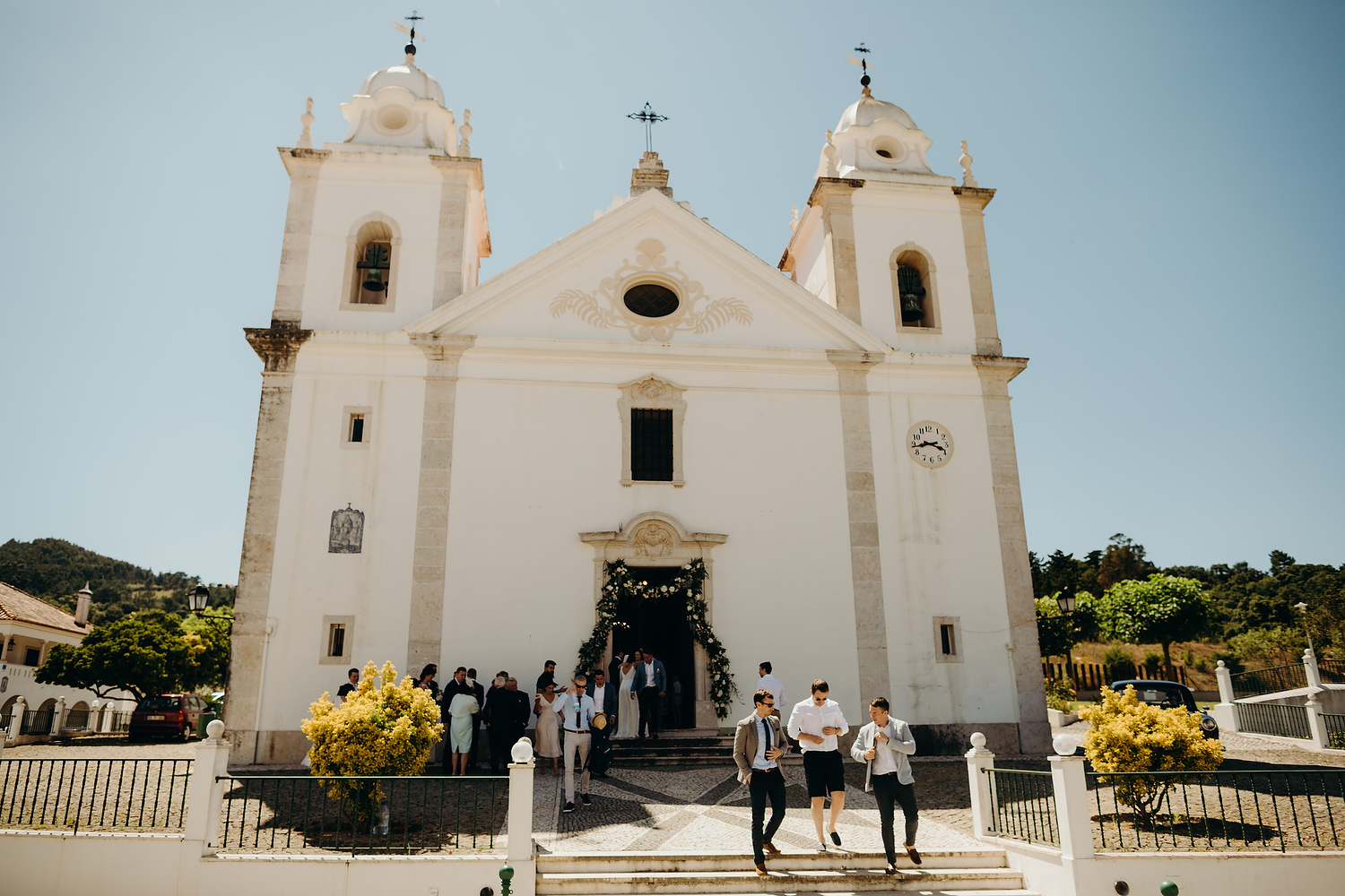 church in Gradil for wedding ceremony as guests leave